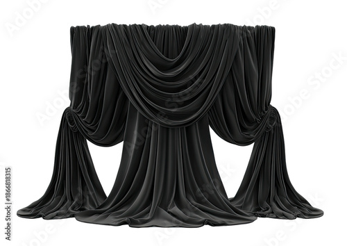 Dramatic black fabric draped theatrically against a black background