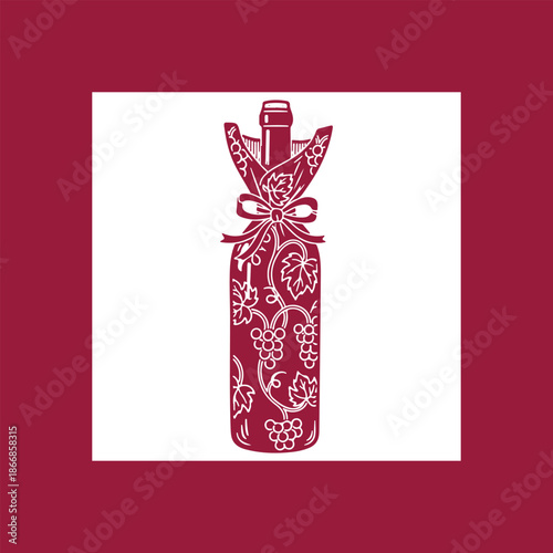 Wine bottle elegantly wrapped with grape vine pattern and bow