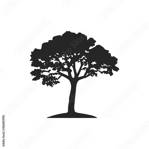 A Silhouette of a Mature, Lush Tree Standing Tall in its Natural Environment, Representing Growth and Resilience
