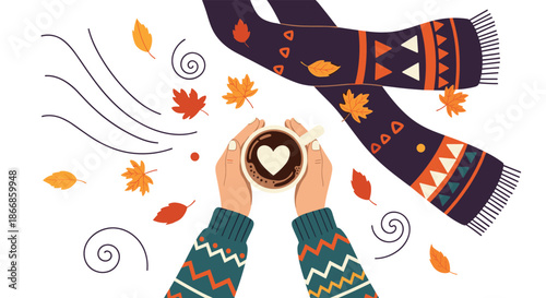 Top down view of hands holding a cup of coffee with a heart surrounded by autumn leaves and a warm patterned scarf for cozy fall vibes.
