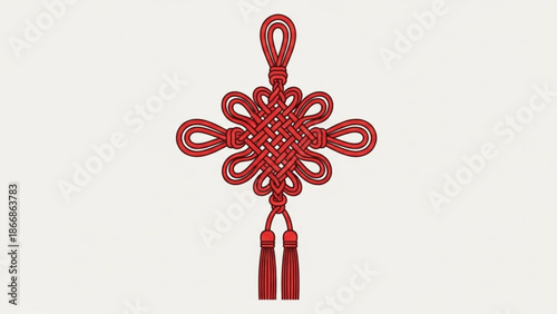 A red Chinese knot ornament with tassels on a white background
