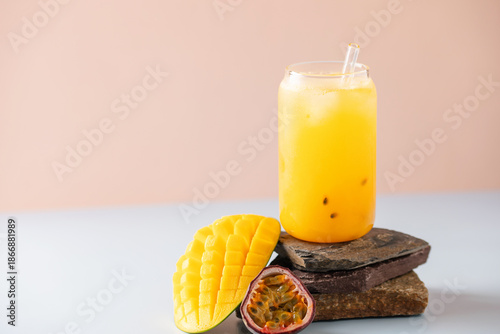 Homemade mango passion fruit lemonade in  glass . Summer refreshment cool drink