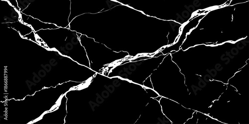 Abstract black marble texture with sharp white veins and natural stone cracks. High contrast luxury background ideal for interior design, wall tiles, countertops, branding, and modern architecture.