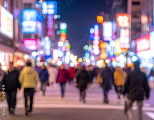 Wallpaper Mural Nighttime street scene with blurred figures walking amongst bright lights Torontodigital.ca