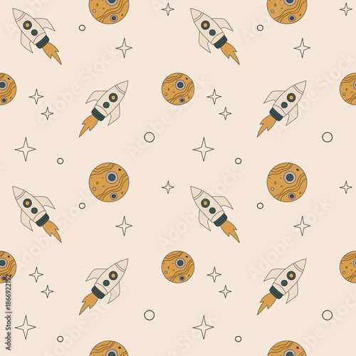 Seamless  space pattern with rockets, planets and stars on a soft pastel background. Used for kids textiles, wallpapers, wrapping paper and prints.
