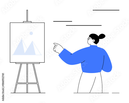 Art creation, education, design, self-expression, creativity, concept visualization. A woman pointing at a canvas stand geometric artwork. Art creation and education concept