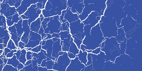 Abstract White Cracked Earth Pattern on Vibrant Royal Blue Background, Vector illustration.