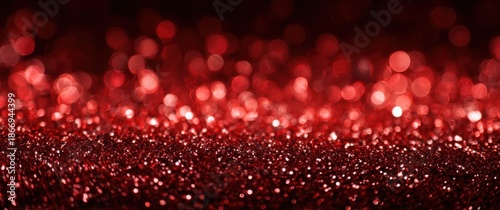 Red glitter background with bokeh-defocused light and copy space for Valentine's Day