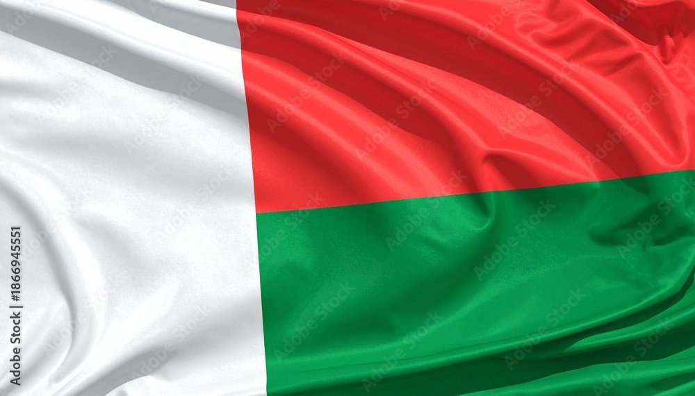 Obraz premium The national flag of Madagascar with vertical white band and horizontal red and green stripes, symbolizing identity and heritage.