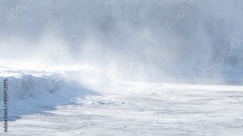 Wallpaper Mural Snow covers ground while wind blows snow dust into the air in a cold area during wintertime Torontodigital.ca