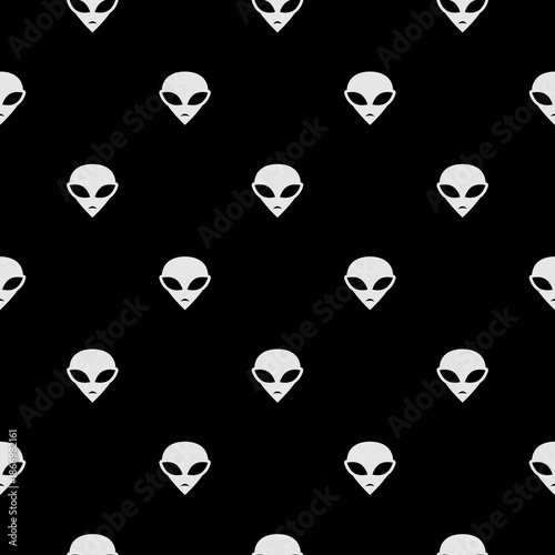 Extraterrestrial alien face seamless pattern isolated on black background