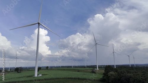 Wind turbines at green mountain hill clean sustainable electricity power, Green generator cloudy blue sky
