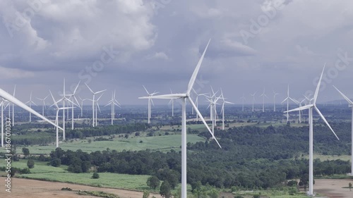 Wind turbines at green mountain hill clean sustainable electricity power, Green generator cloudy blue sky
