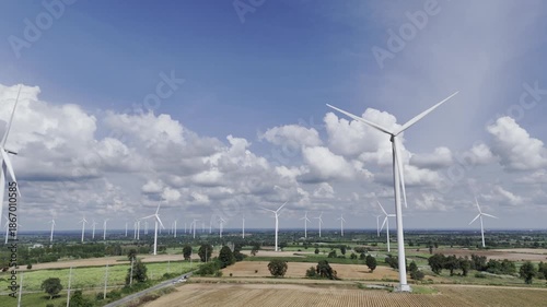Wind turbines at green mountain hill clean sustainable electricity power, Green generator cloudy blue sky