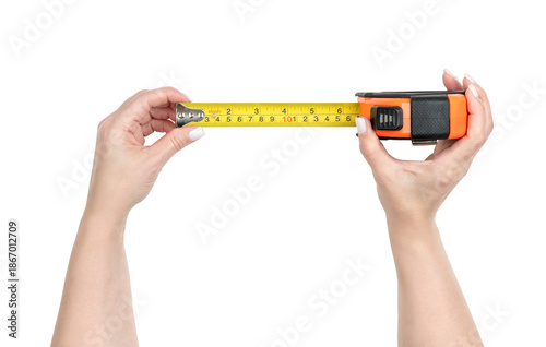 Woman hands holding a yellow measuring tape, isolated object with transparent background PNG, accurate measuring tool for DIY, construction, home renovation or sewing projects