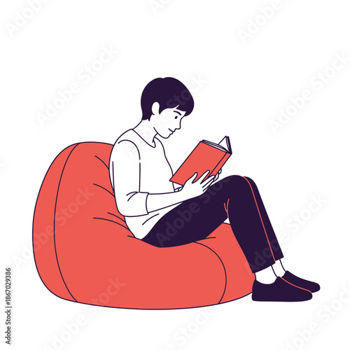 A person reading a book while comfortably sitting on a bean bag chair