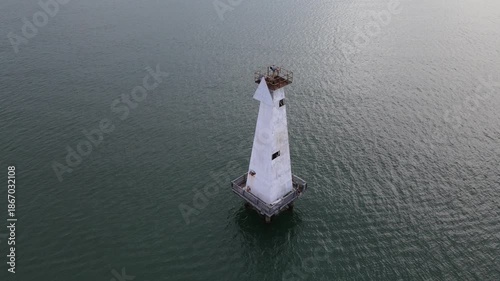 Scenic Drone Footage of Offshore Lighthouse in the Afternoon, Coastal Seascape