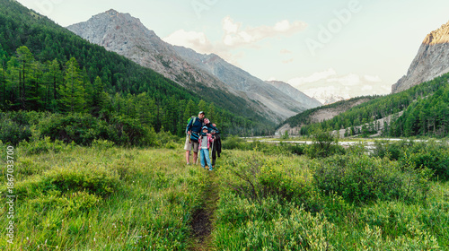 Family adventure trip in the mountains in summer