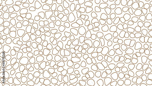 A blurry image of numerous small rounded objects in various shades of brown and beige