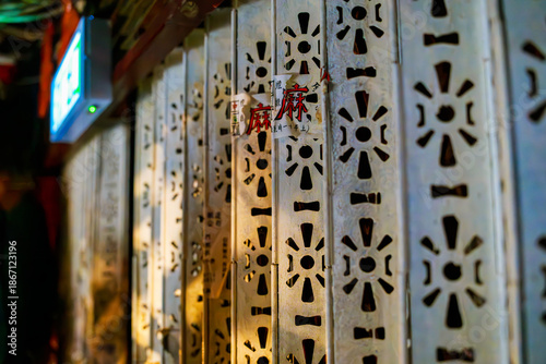 Rolling shutters of shops in 1980s Hong Kong.