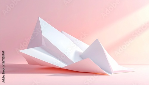 Geometric paper forms arranged artistically on pastel background with soft lighting
