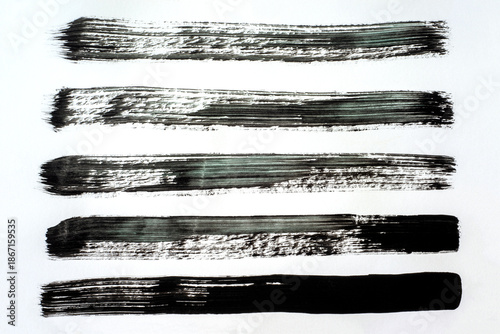 Abstract Black Horizontal Brush Strokes on White Background Texture