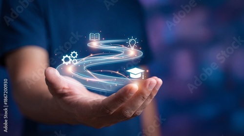 Person holding glowing education icons in hand with swirling light trails