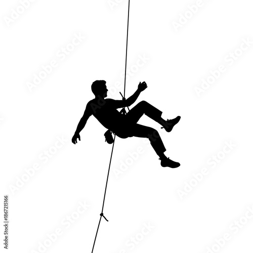 Silhouette of a Climber Suspended on a Rope.