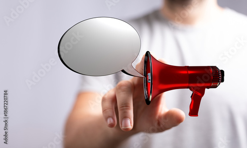 Person holding megaphone wi...