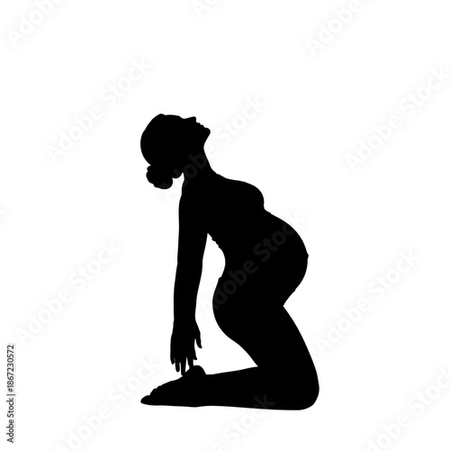 Silhouette of a Pregnant Woman Kneeling with Head Back.