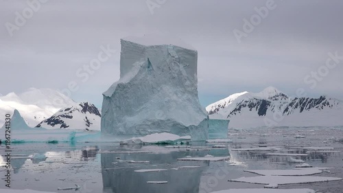 Iceberg formation observed in the ocean around Greenland on a clear day in summer