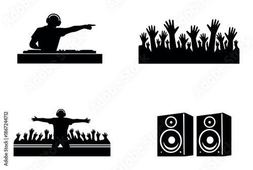 Silhouetted dj and crowd with speakers in concert setting