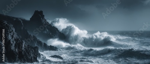 Dramatic Ocean Waves Crashing Against Rugged Dark Cliffs Under a Stormy Sky