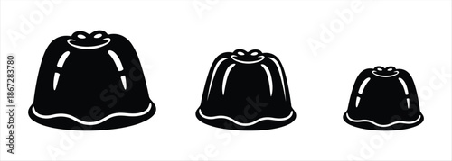 Three Black Jellies Of Different Sizes On A White Background