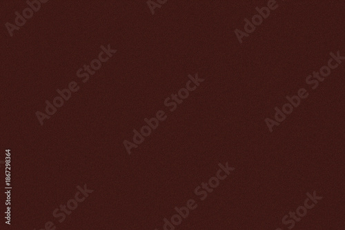 Seamless abstract background velvet texture featuring dark reddish brown color with fine grain noise pattern