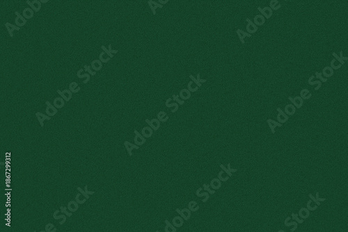 Dark forest green velvet textured background featuring fine grain noise for abstract visual depth and contrast