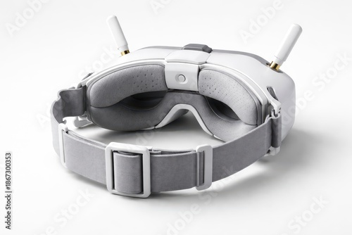 Drone Control Glasses With Integrated Antennas.
Modern drone control glasses featuring a sleek headset design with dual antennas and immersive visor.