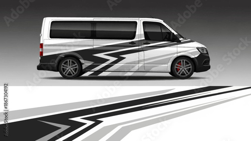 White minivan features bold black geometric decals and a sleek graphic wrap along the sides and doors.