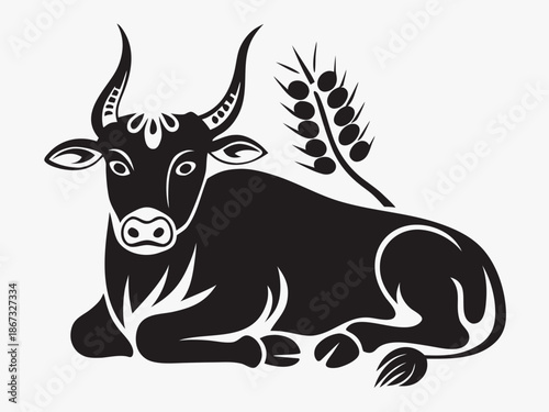 A black silhouette of a bull resting near wheat stalks