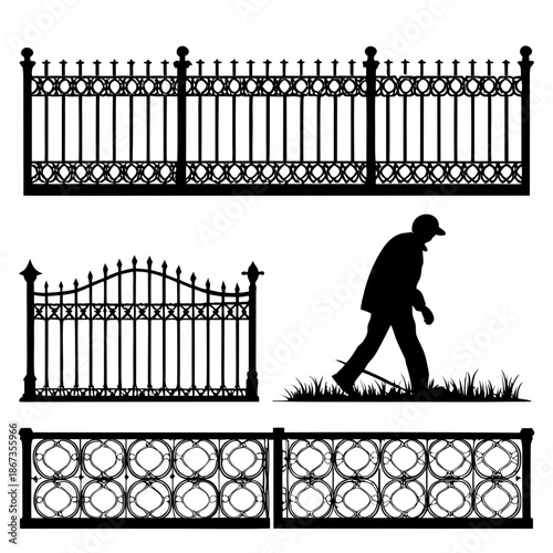 Silhouette of man walking past iron fences