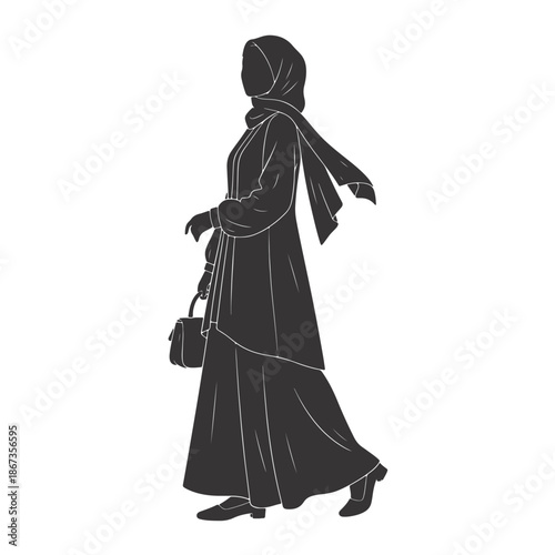 Hijab silhouette woman walking in fashionable modest clothing