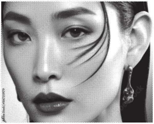 Striking portrait of a woman with dramatic makeup and elegant earring