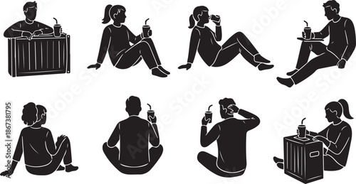 Silhouette of people sitting with luggage and devices
