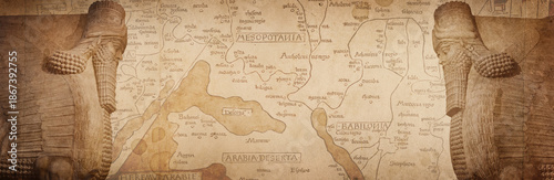 Φωτογραφία Ancient map and winged statue of Lamassu, a mythical Assyrian deity