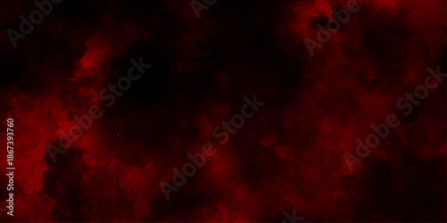 Red clouds in the black sky surreal background with copy space for design, red powder explosion freeze motion of red particles splashing, designed for atmospheric fantasy or horror visual concepts. 
