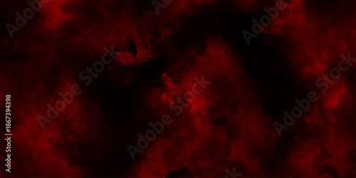Red clouds in the black sky surreal background with copy space for design, red powder explosion freeze motion of red particles splashing, designed for atmospheric fantasy or horror visual concepts. 