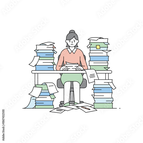 Woman sitting at desk with stacks of books and papers in cluttered workspace  