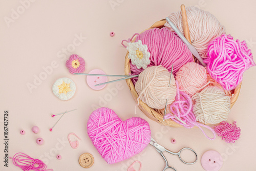 Handmade spring decor concept. Creative crocheting, house figurine, traditional flowers and hearts