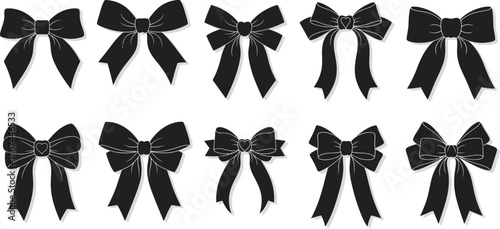 Collection of black ribbon bows in various styles and sizes