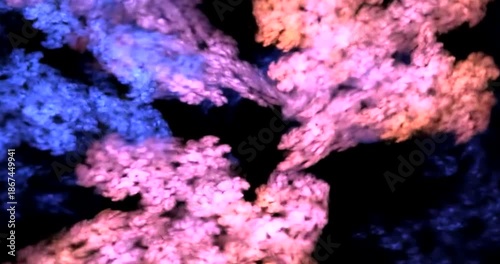 Abstract Colorful Smoke Clouds Moving on Black Background.